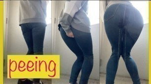 OL Wearing Jeans in Front of a Public Toilet Desperate to Pee